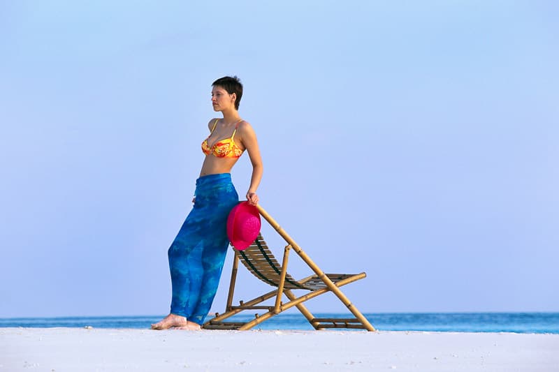 Leaning on Chair at Beach