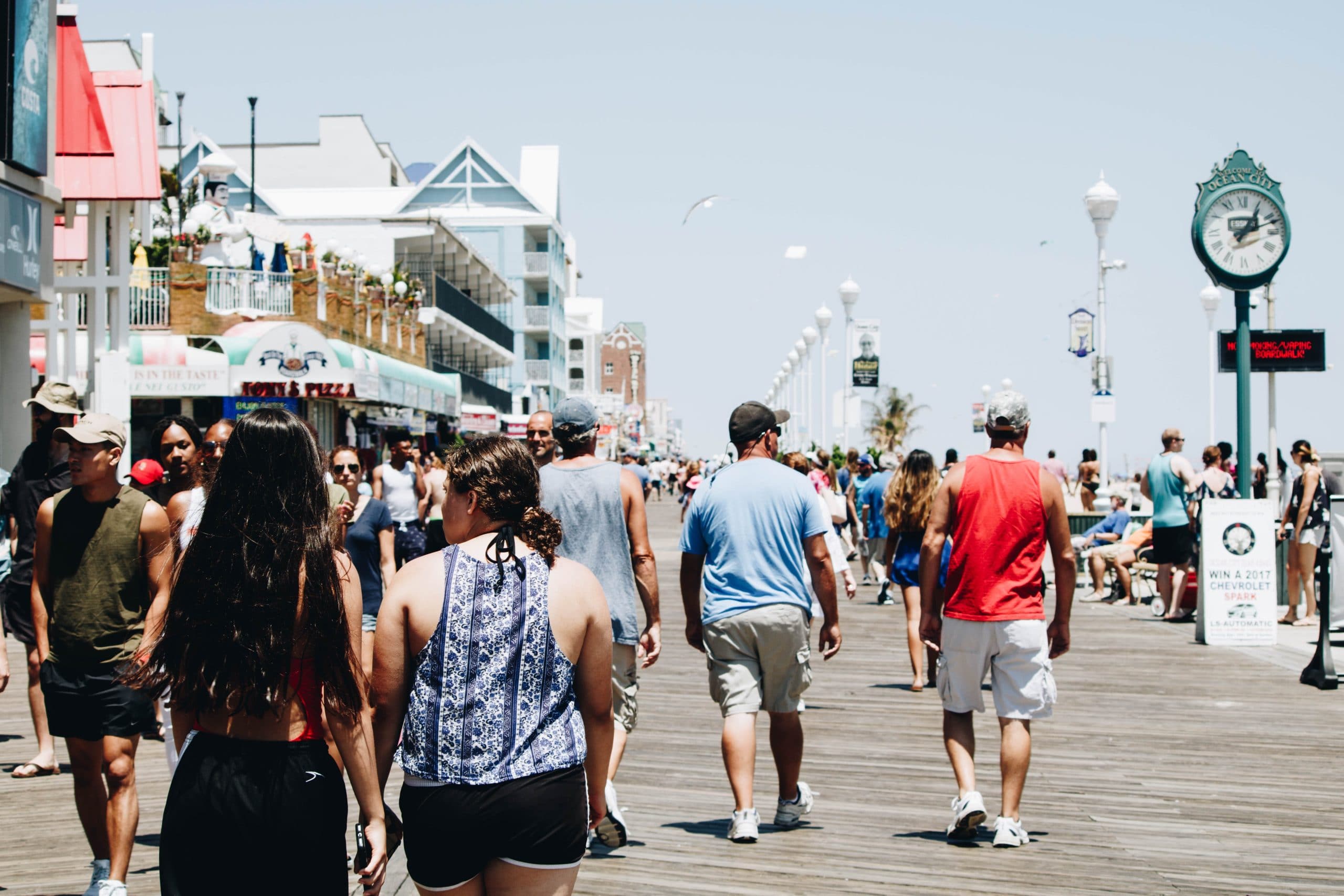 tourists walking along the seaside